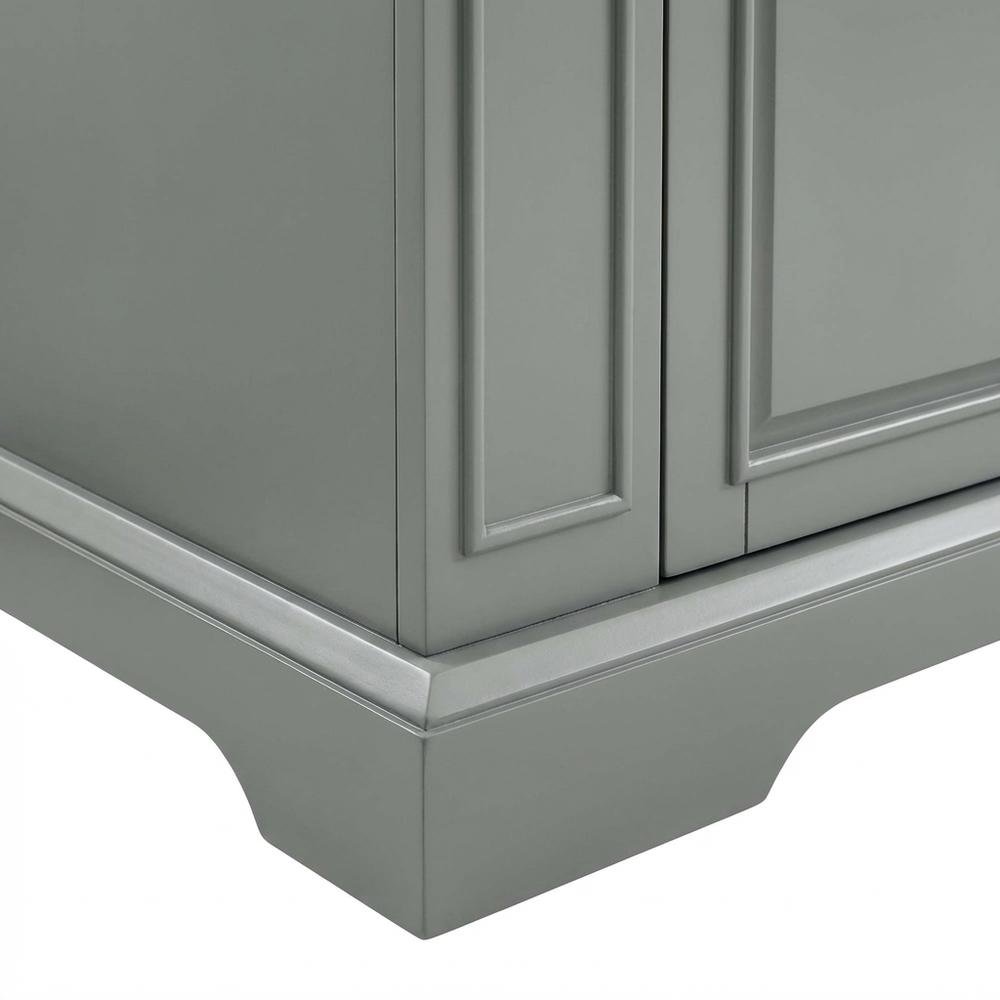Gray kitchen island with stainless steel accents and anti-tip safety