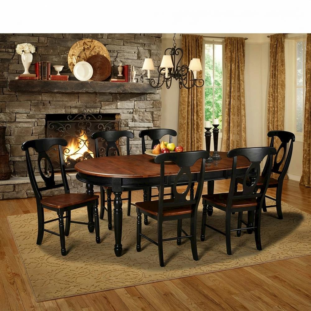 Black oval dining table with solid rubberwood top and casual style