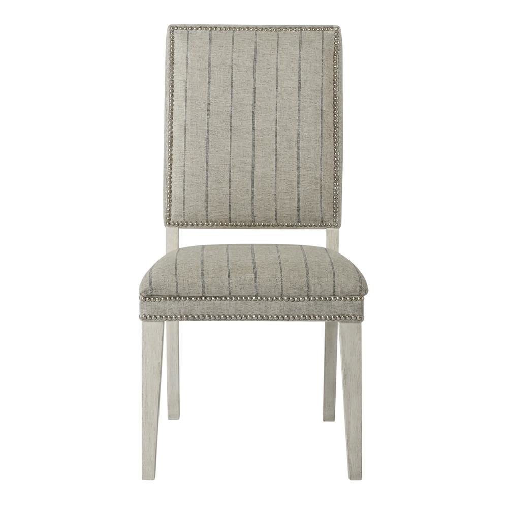 Sandbar-colored dining chair pair with distressed finish and stylish design