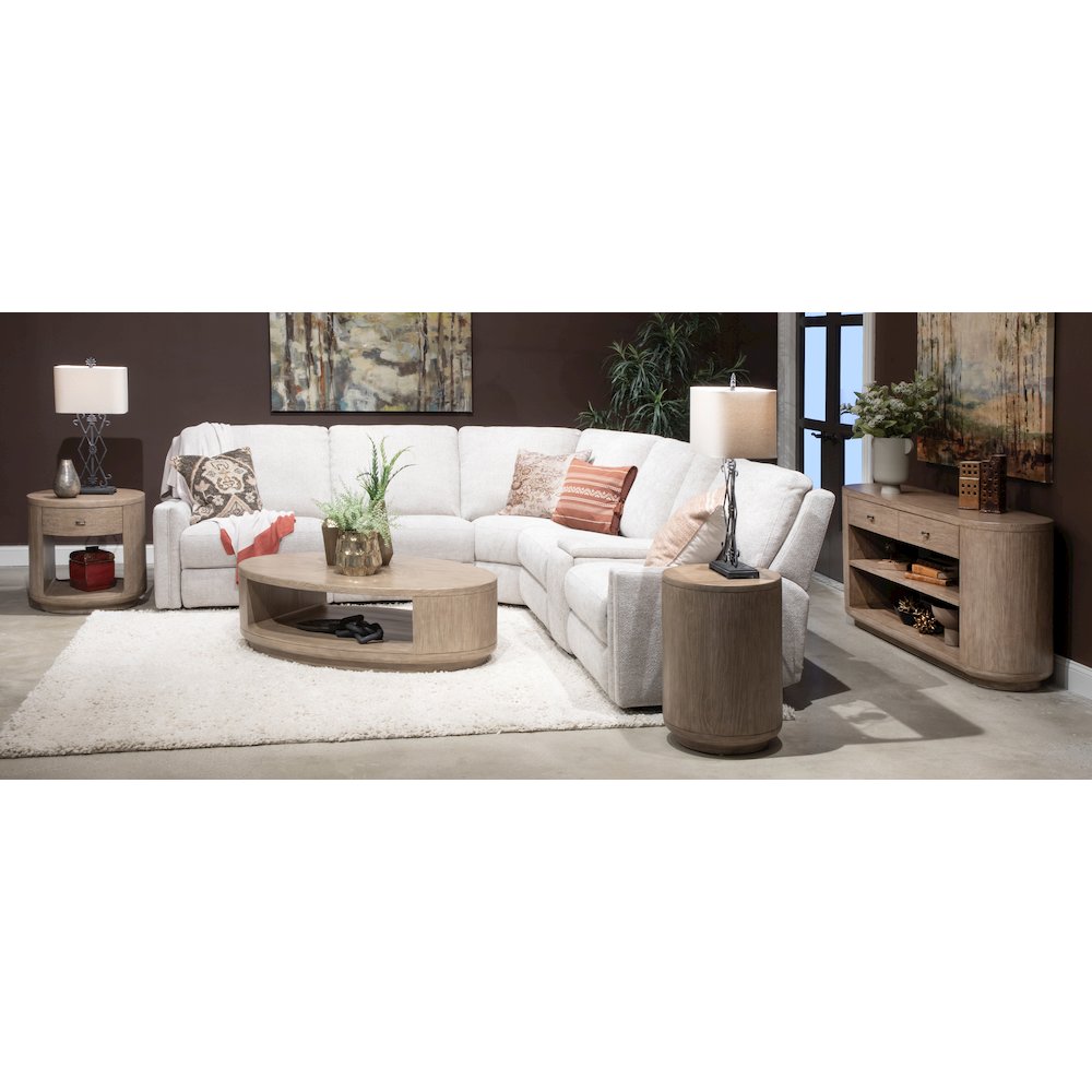 Sanford Chateau Brown Oval Cocktail Table With Casters