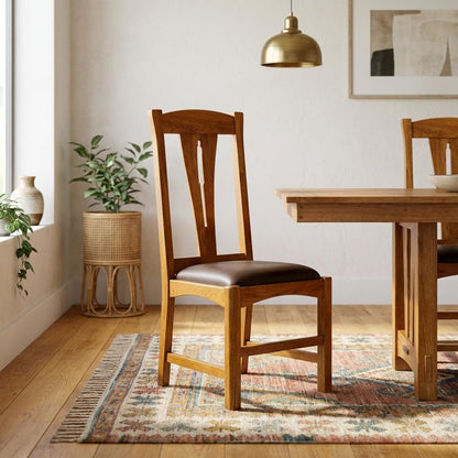 Set of 2 distressed amber wood side chairs with top grain leather seats