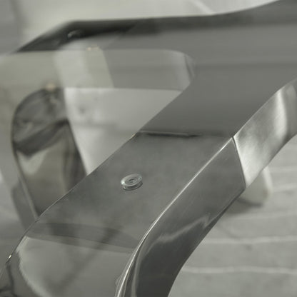 Designer Louis Lara's Cirrus table has polished base connector with brushed stainless steel and 15mm Tempered glass Top Smoke