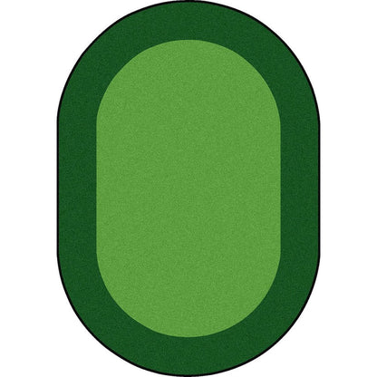 Kid Essentials All Around 7'8" x 10'9" Oval Area Rug in Color Green
