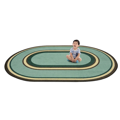 Kid Essentials Ripples 5'4" x 7'8" Oval Area Rug in Color Woodland