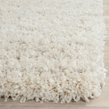 Beige Ivory Area Rug with Power Loomed Construction and Medium Rectangle Shape