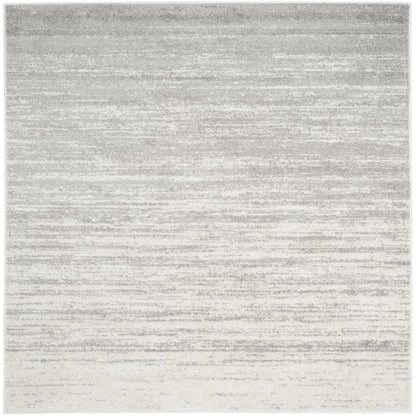 Ivory and Silver Square Area Rug with Power Loomed Polypropylene Pile