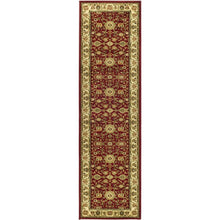 Red and ivory area rug with power loomed polypropylene pile, runner size