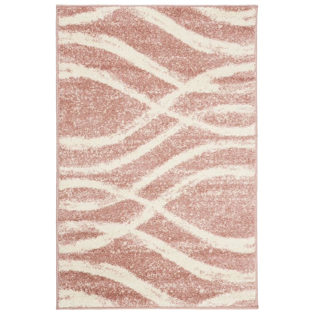 Cream and rose area rug with power loomed polypropylene pile in accent shape