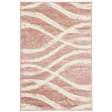 Cream and rose area rug with power loomed polypropylene pile in accent shape