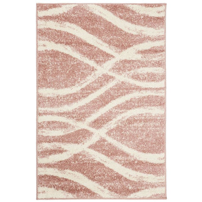 Cream and rose area rug with power loomed polypropylene pile in accent shape