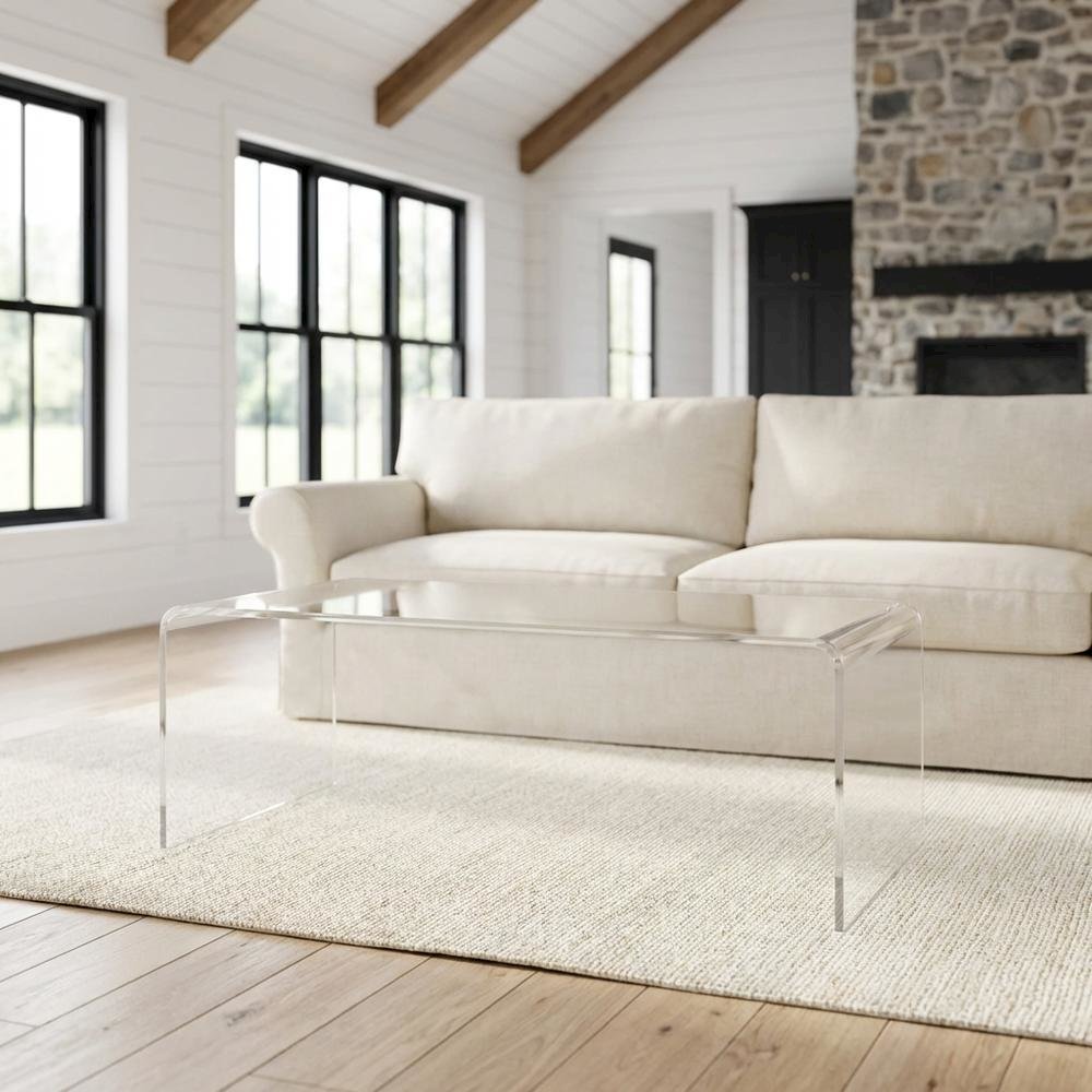 Clear acrylic coffee table with sleek design and lightweight build