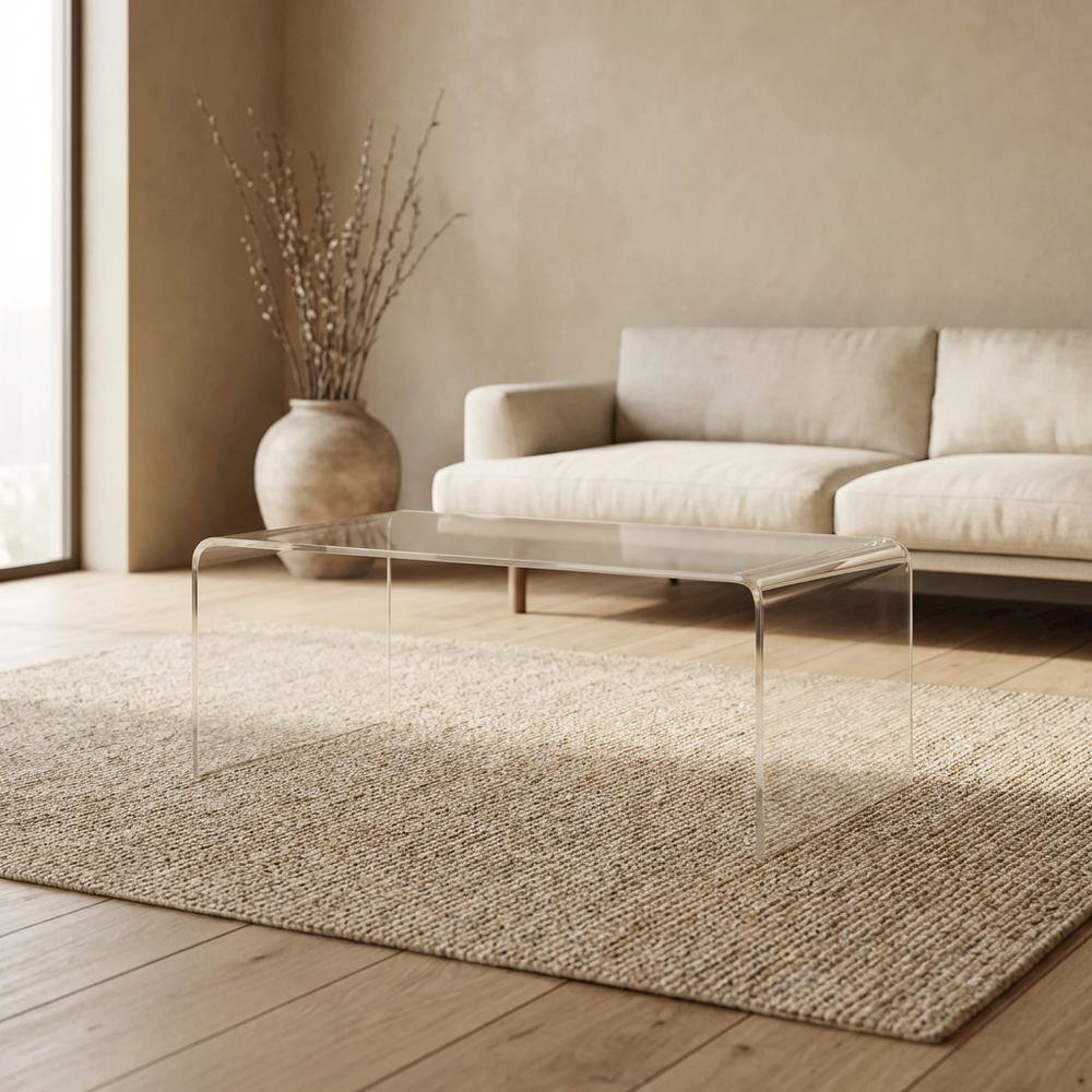 Clear acrylic coffee table with sleek design and lightweight build