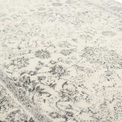Ivory and Silver Area Rug with Power Loomed Design and Plush Polypropylene Pile