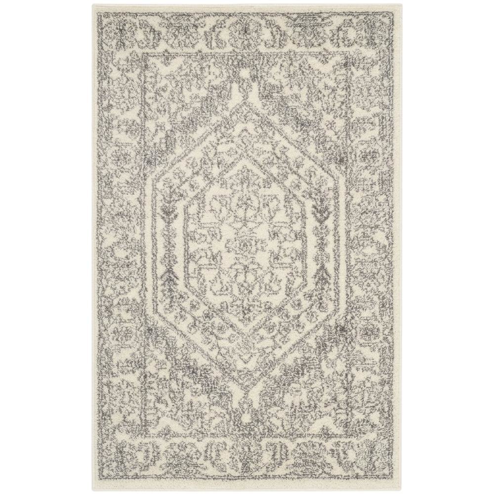 Ivory and Silver Area Rug with Power Loomed Polypropylene Pile for Accent Spaces