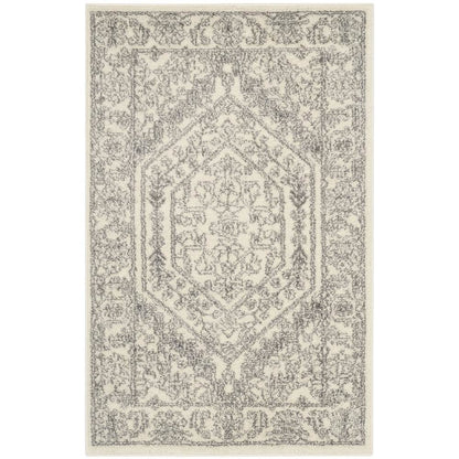 Ivory and Silver Area Rug with Power Loomed Polypropylene Pile for Accent Spaces