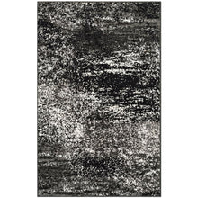 Gray and Black Area Rug with Power Loomed Polypropylene Pile for Accent Spaces