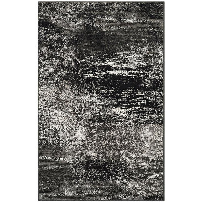 Gray and Black Area Rug with Power Loomed Polypropylene Pile for Accent Spaces