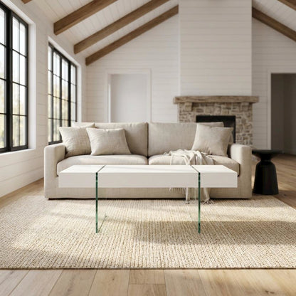 Modern white glass top coffee table with clear glass legs and sturdy MDF frame