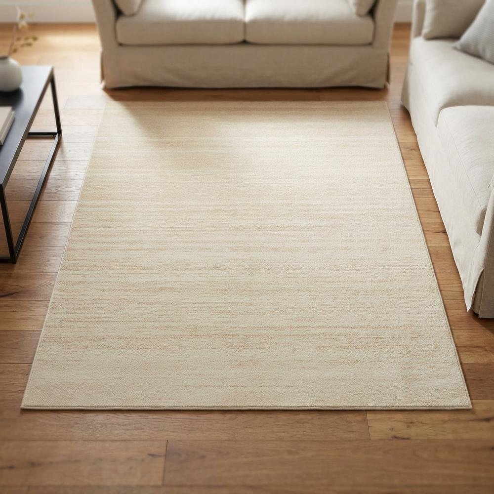 Cream and champagne area rug with polypropylene pile, power loomed