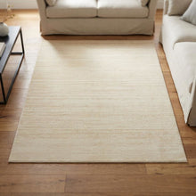 Cream and champagne area rug with polypropylene pile, power loomed