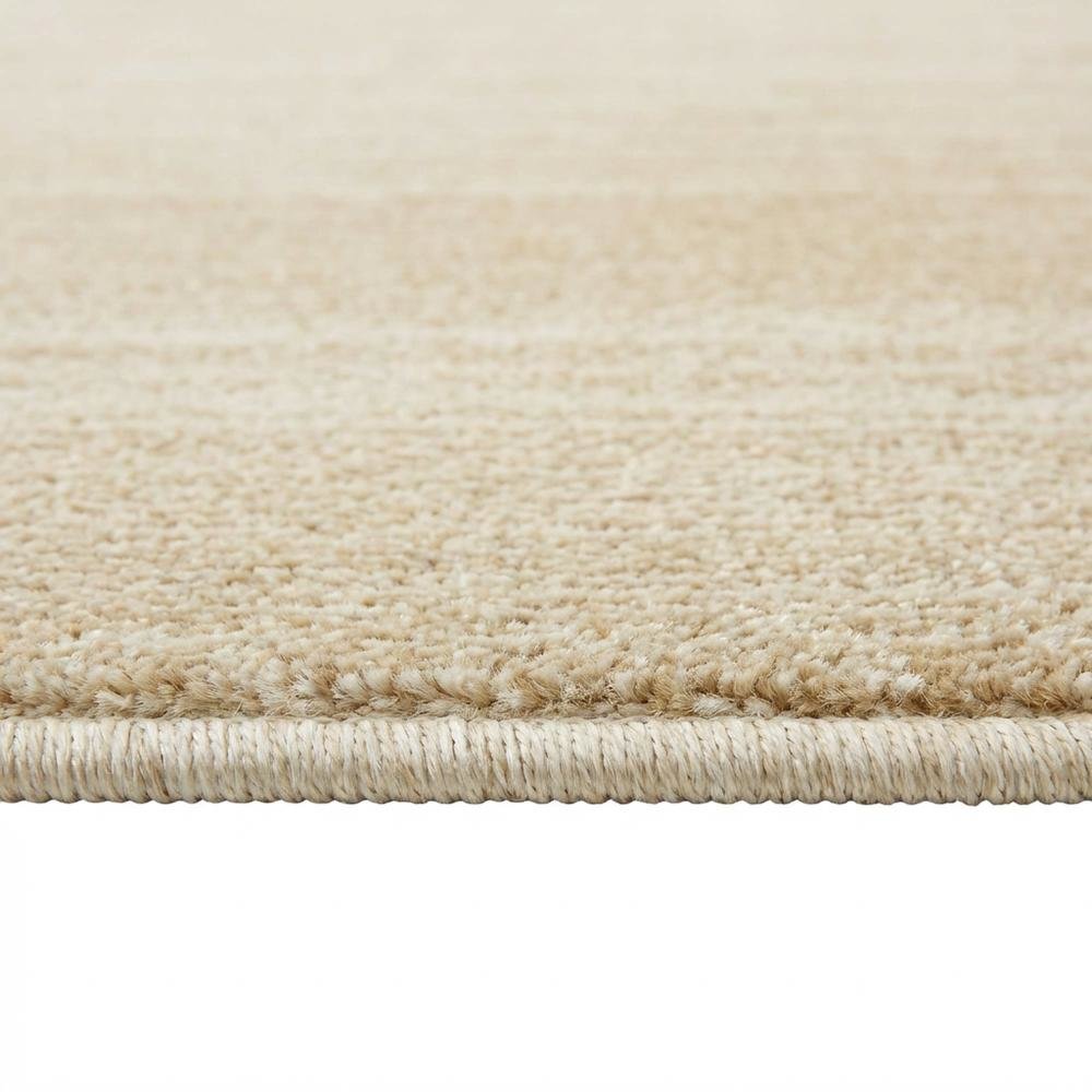 Cream and champagne area rug with polypropylene pile, power loomed