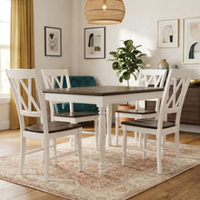 White dining table with four matching chairs and anti-tip hardware layout