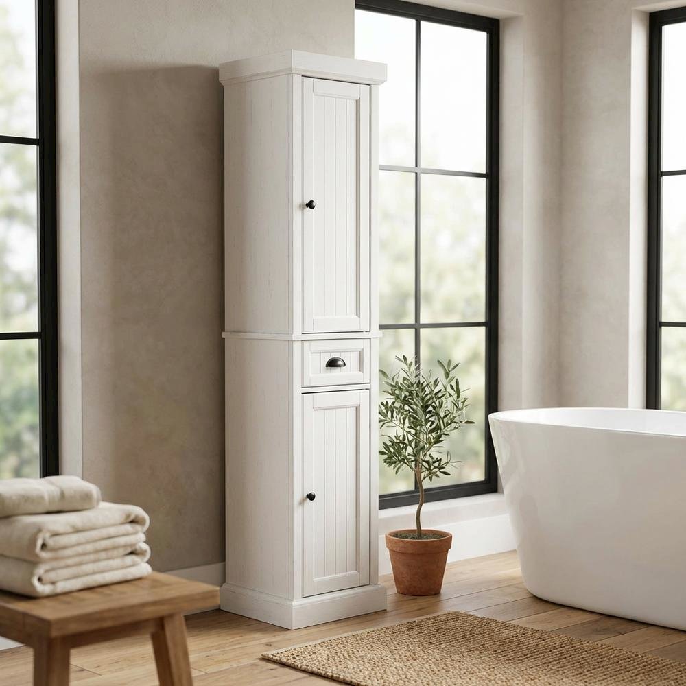 Tall linen cabinet in distressed white with anti-tip hardware