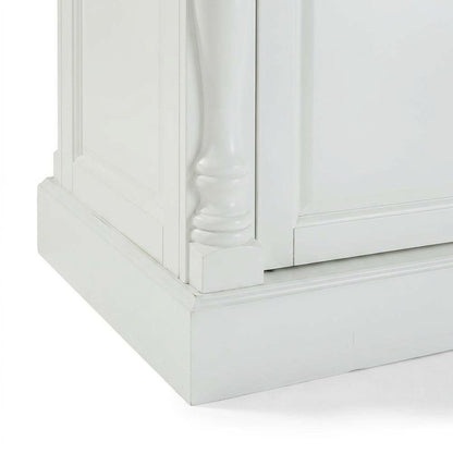 White kitchen island with butcher block top and anti-tip safety feature