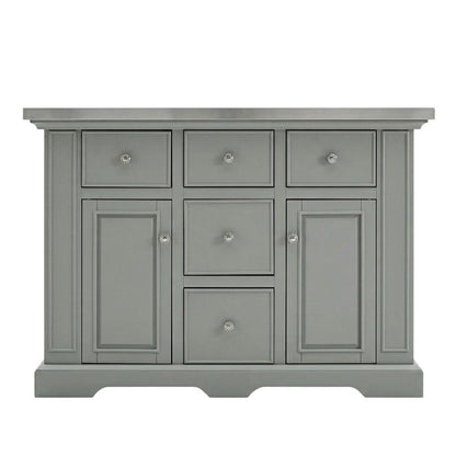 Gray kitchen island with stainless steel accents and anti-tip safety