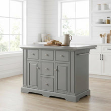 Gray kitchen island with stainless steel accents and anti-tip safety