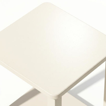 White wood nightstand with compact design and versatile surface