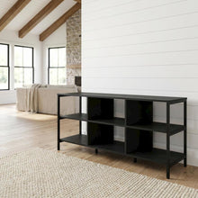 Modern black TV stand with open shelves for entertainment centers