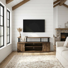 Large entertainment center in brown walnut and black finish with ample storage