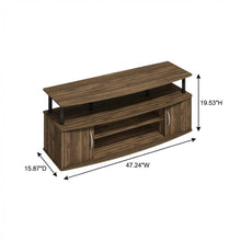 Large entertainment center in brown walnut and black finish with ample storage