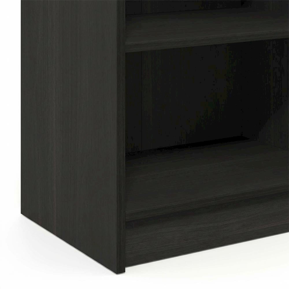 Wooden bookcase with open shelving and sturdy construction