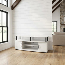 White entertainment center for up to 55-inch TVs with spacious storage, modern