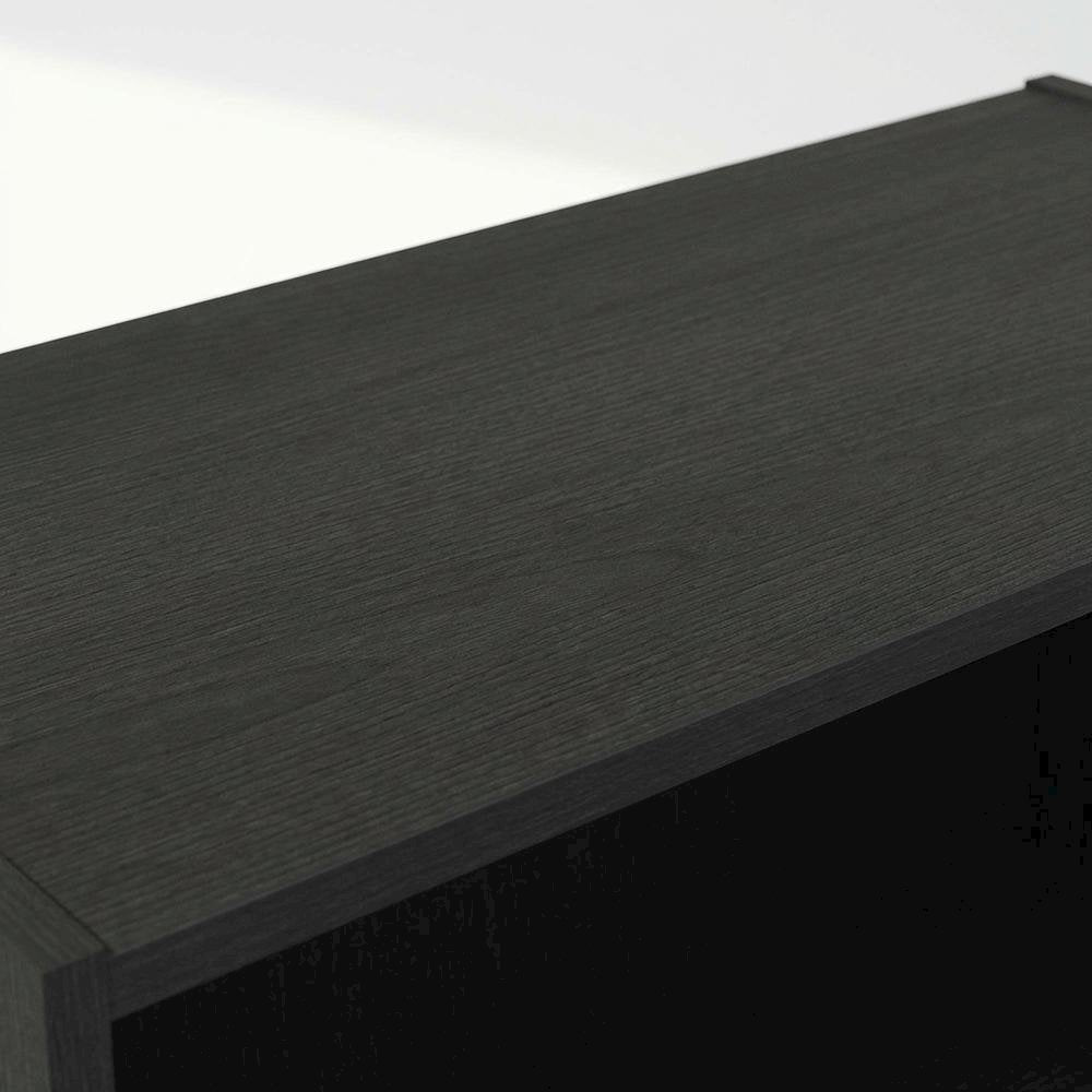 Wood bookcase with sleek design for versatile storage