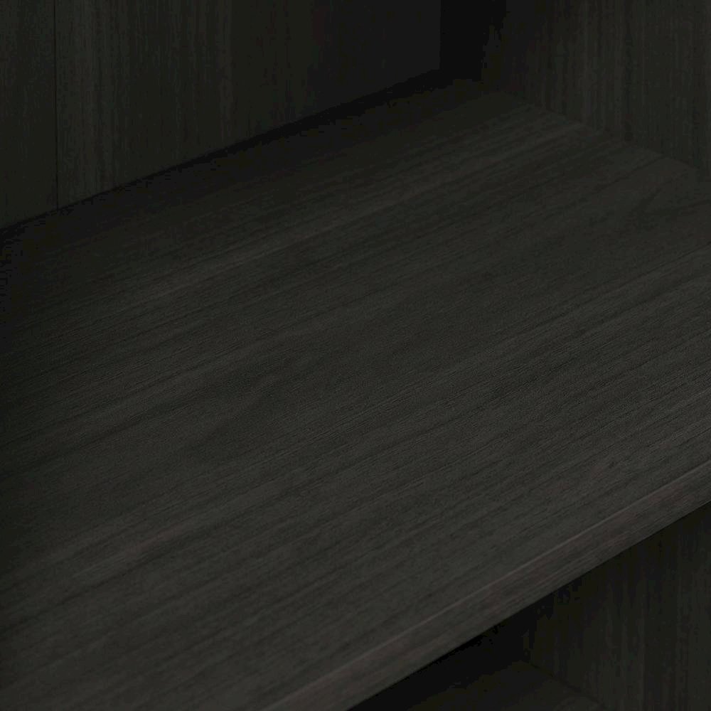 Wooden bookcase with open shelving and sturdy construction