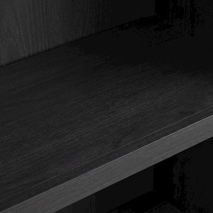 Bookcase in black wood with spacious open shelves for versatile storage