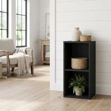 Black wooden bookcase with compact height and modern design, sturdy construction