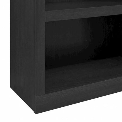 Bookcase in black wood with spacious open shelves for versatile storage