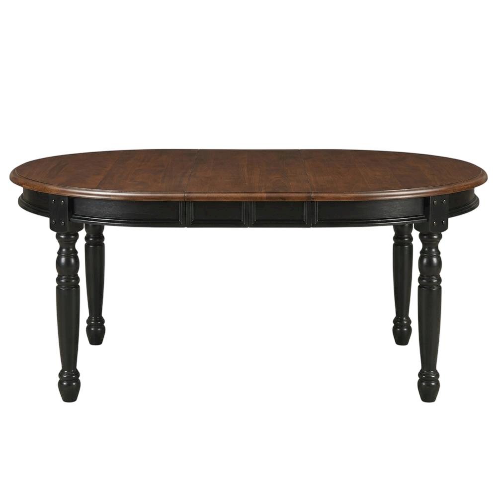 Black oval dining table with solid rubberwood top and casual style