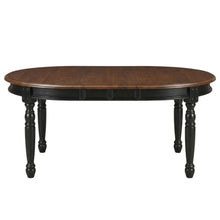 Black oval dining table with solid rubberwood top and casual style