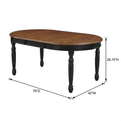 Black oval dining table with solid rubberwood top and casual style