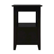 Black end table with built-in charging station and spacious shelf