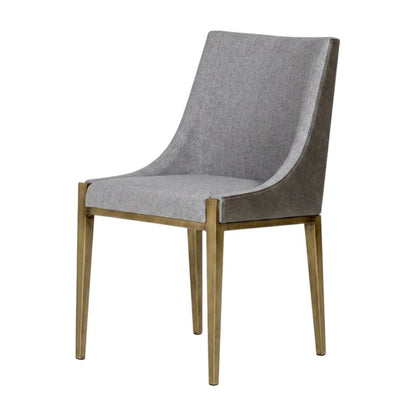 Modern grey and brass dining chair with padded seat and sleek design