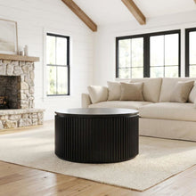 Round Coffee Table with Casters in Black Finish, Modern Stylish Design