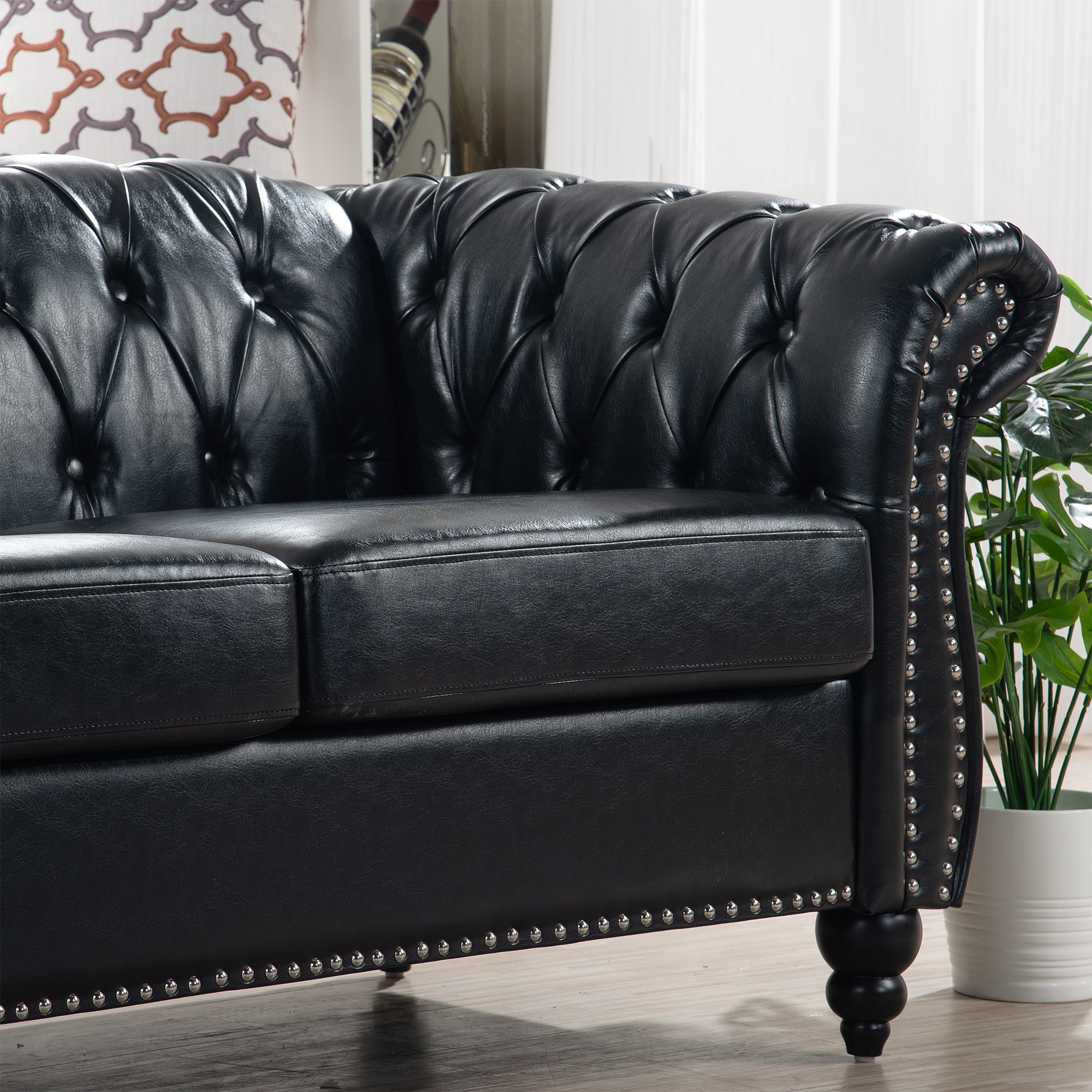 84.65" BLACK PU Rolled Arm Chesterfield Three Seater Sofa.