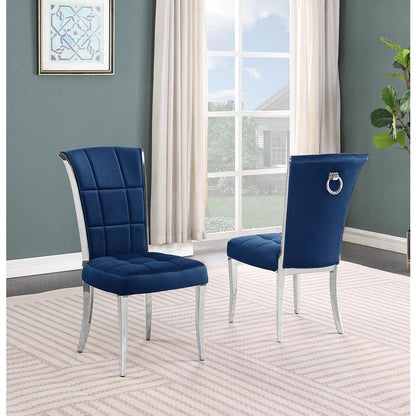 9-piece glam dining set with 8 navy blue chairs and a 95" long glass  table