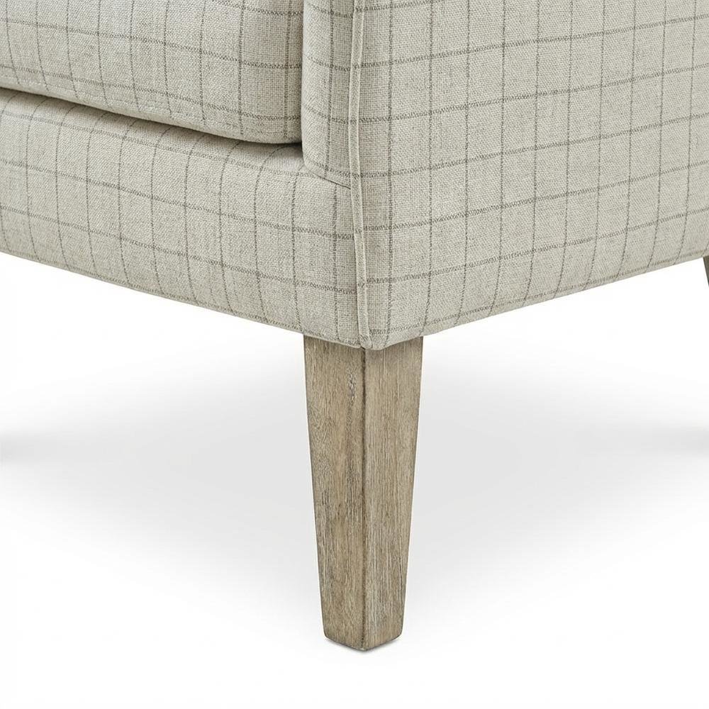 Beige Wing Chair with Stylish Design and Comfortable Upholstery